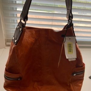 New with Tags Tano leather burnt Orange handbag.